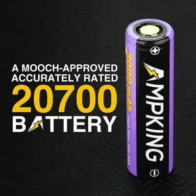 20700 battery standing upright, labeled as Mooch-approved, 3000mAh, AMPKING.